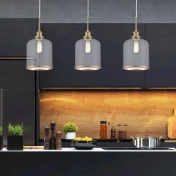 Dorina 1-Light Antique Gold Mason Jar Hanging Mini Kitchen Pendant Light with Clear Glass Shade by Bel Air Lighting -GlowNest Shop antique gold bel air lighting pendant lights pnd 2184 ag e1 1000