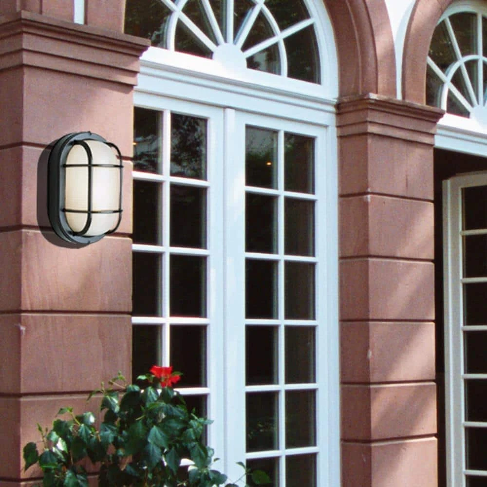 Aria 8.25 in. 1-Light Black Oval Bulkhead Outdoor Wall Light with Ribbed Glass by Bel Air Lighting 4 Aria 8.25 in. 1-Light Black Oval Bulkhead Outdoor Wall Light with Ribbed Glass by Bel Air Lighting - Image 2