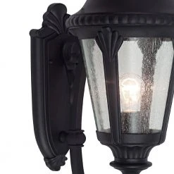 Commons 1-Light Black Outdoor Wall Light Coach Lantern with Seeded Glass by Bel Air Lighting -GlowNest Shop black bel air lighting outdoor sconces 5040 bk 1f 1000