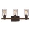 Siesta 22.75 in. 3-Light Oil Rubbed Bronze and Faux Wood Bathroom Vanity Light Fixture with Seeded Glass by Bel Air Lighting -GlowNest Shop rubbed oil bronze bel air lighting vanity lighting 21843 rob 64 1000